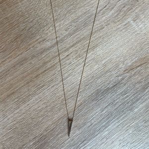 Adina Reyter gold necklace with silver and pave diamond triangle